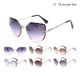 K1002-QX Gafas de sol deportivas de plástico para niños al por mayor 1 docena (12 piezas)